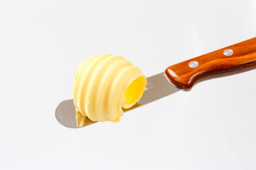 butter curl on table knife
