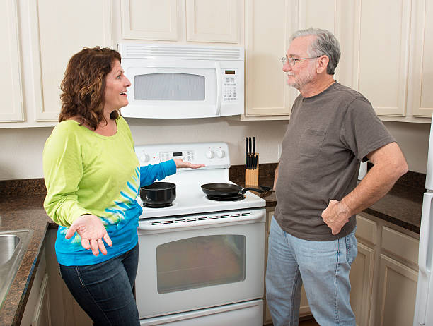 istock Mature couple argues in kitchen 478260813