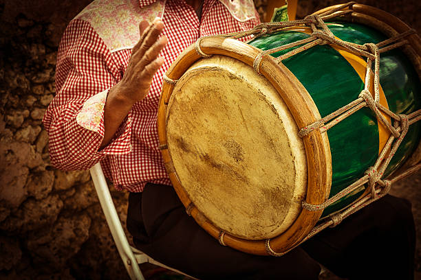 istock street percussionist playing african drum 478261123