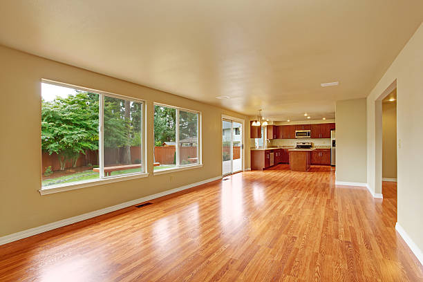 Empty house interior with new hardwood floor stock photo