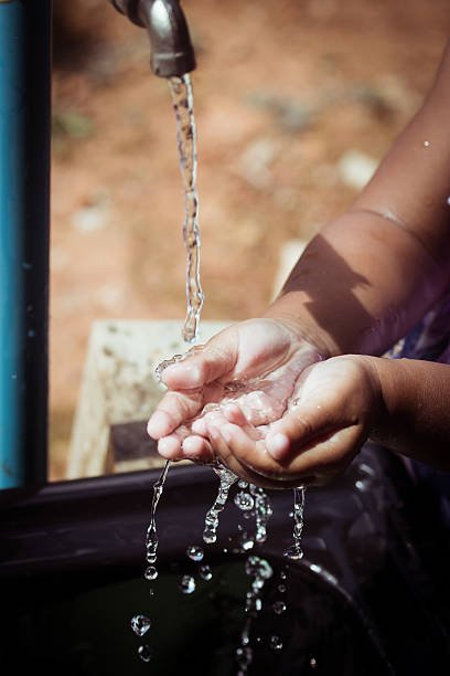 istock Washing of child hands under running water 478262700
