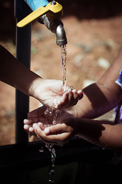 istock Washing of child hands under running water 478262704