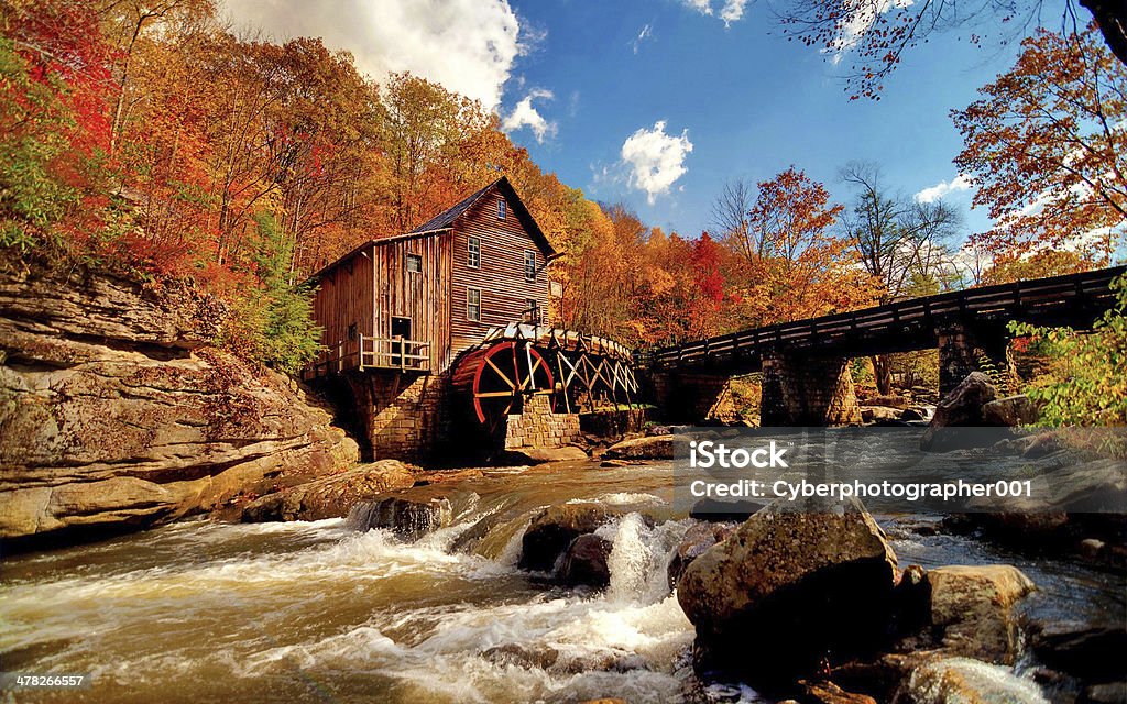 exelent scenery house, trees, water and bridge showing excellent scenery. Beauty Stock Photo