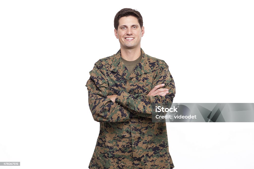 Portrait of a confident young soldier posing with arms crossed Young soldier posing with arms crossed Arms Crossed Stock Photo