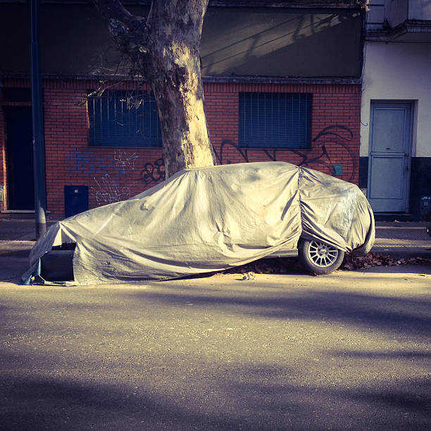 istock Covered car in the street 478267552