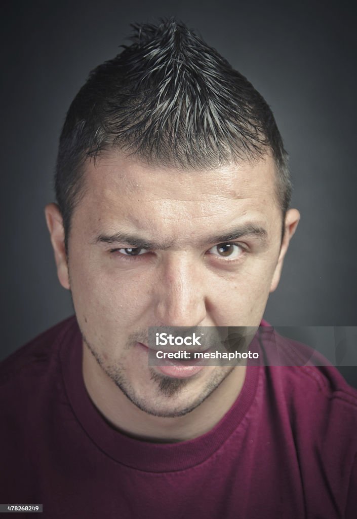 Giovane uomo Fare una smorfia - Foto stock royalty-free di 25-29 anni