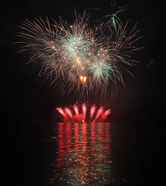 istock Colorful fireworks with reflection on lake. 478273140