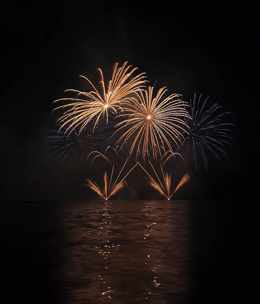 istock Colorful fireworks with reflection on lake. 478273294