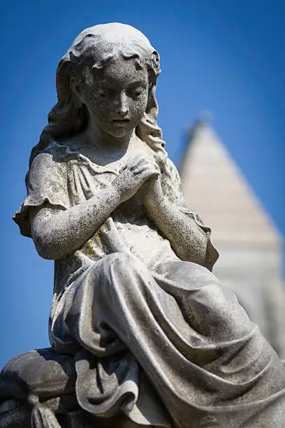 Photo of Praying Girl Statue