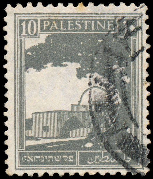 istock Stamp printed in Palestine shows building 478276369