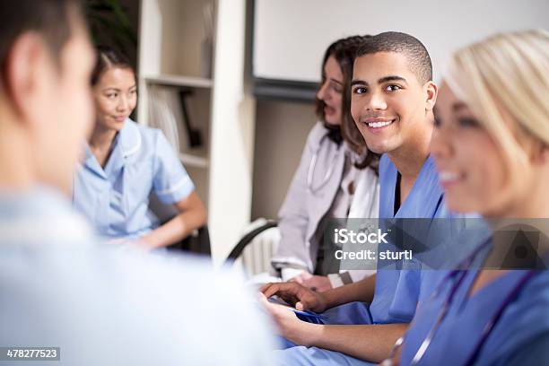 Medical Team Meeting Stock Photo - Download Image Now - Education Training Class, Nurse, 20-29 Years