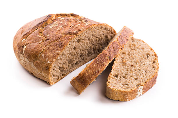 rye bread freshly baked homemade rye bread on white background Rye Bread stock pictures, royalty-free photos & images