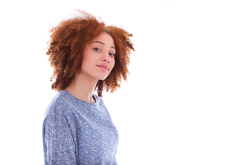 Young african american teenage girl isolated on white background