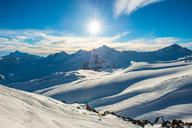 istock Snowy blue mountains in clouds 478278786