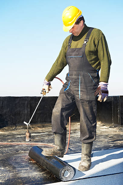 istock Flat roof covering works with roofing felt 478279488