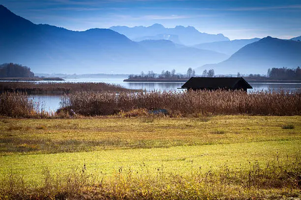 Autumn on lake Chiemsee with view to the bavarian alps, Germany