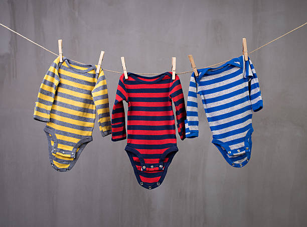 istock Baby laundry hanging on a clothesline 478279692