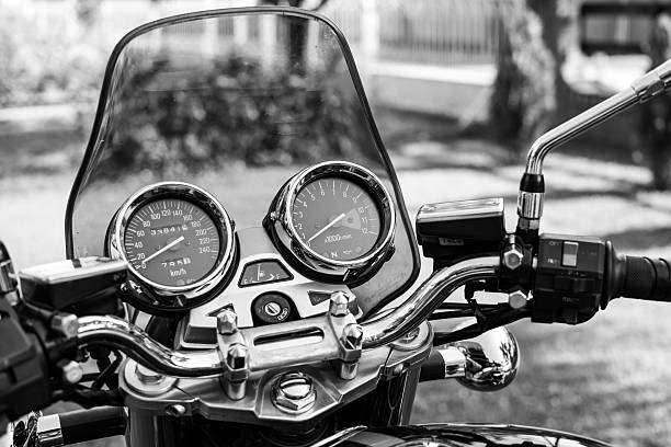 Subotica, Serbia - Jun 13, 2015: Photo shoot of Kawasaki ZR 1100 Zephyr A1 bike from 1992, close up shoot of a steering wheel, speedometer, handles, tachometer and chrome parts. Four stroke transverse four cylinder,1062cc, air cooled. Black and white photo. Photographed in the family house backyard in Subotica, Serbia.Selective focus: tachometer