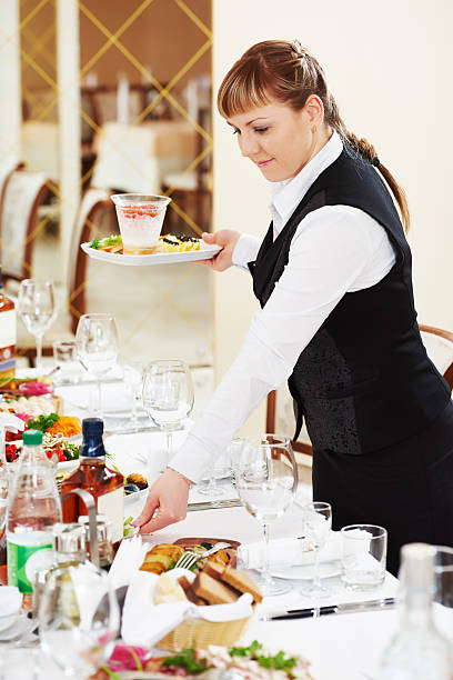 istock two waitress at catering work in a restaurant 478280726