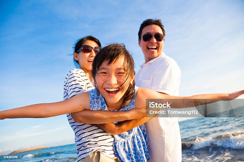 happy family enjoy summer vacation on the beach 2015 Stock Photo