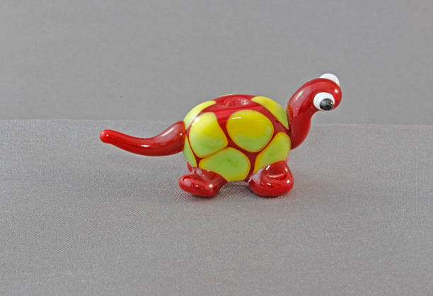 istock Hand Made Lamp Work Glass Dinosaur Bead 478281652