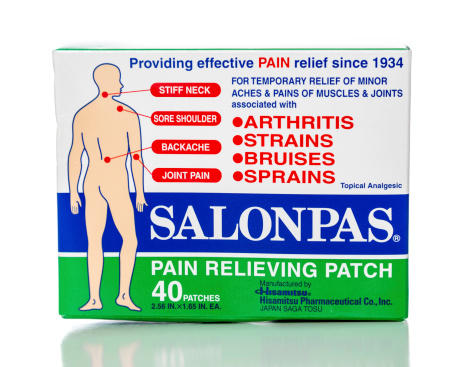 Miami, USA - February 22, 2014: Salonpas pain relieving 40 patches box. Salonpas brand is owned by Hisamitsu Pharmaceutical Co, Inc.