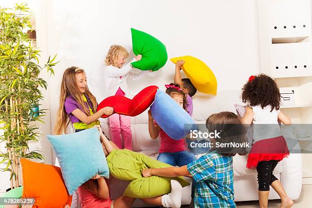 Kids Playing Pillow Fight Stock Photo - Download Image Now - Pillow Fight, Child, Mischief