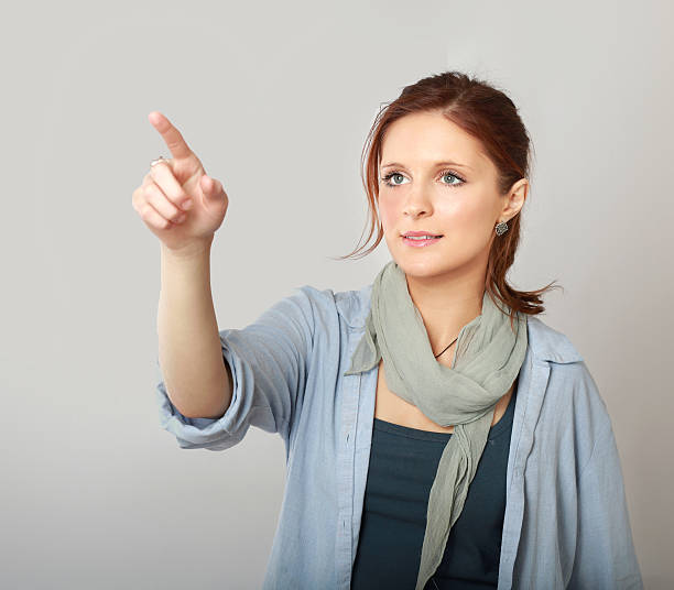 istock successful woman showing something 478285803