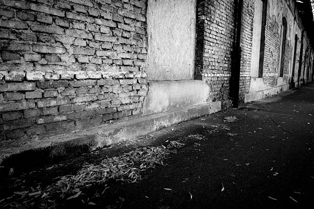 istock dirty alley with a brick wall 478286197