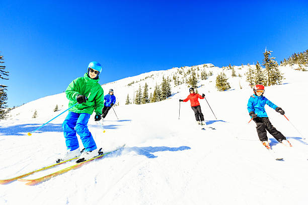 istock skiing family of four 478286405