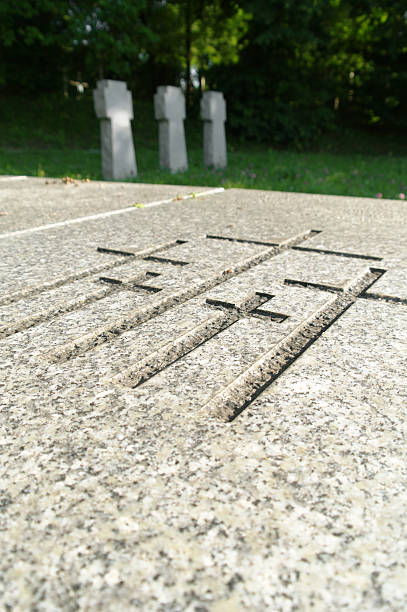 istock engraved crosses in a marble plate on graveyard 478286978