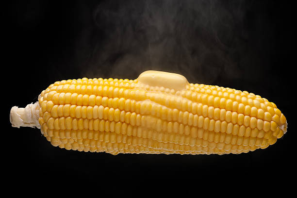 Hot corn with steam and melting butter