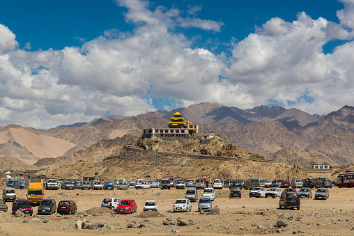 Ladakh,India - July 8,2014 : Many Cars park around the Kalachakra Teachings area in Leh, Ladakh.