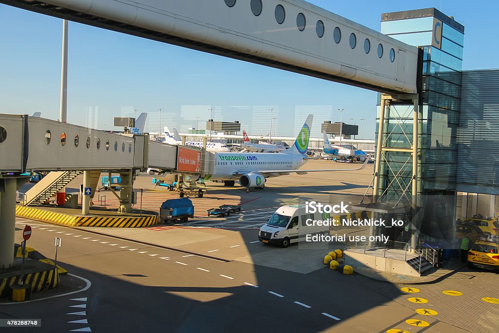 Maintenance of aircraft on the airfield at the airport Amsterdam Amsterdam Schiphol, Netherlands - April 18, 2015:  Bartenders serve customers in the cafe  at the airport Amsterdam Schiphol, Netherlands Amsterdam Schiphol Airport Stock Photo