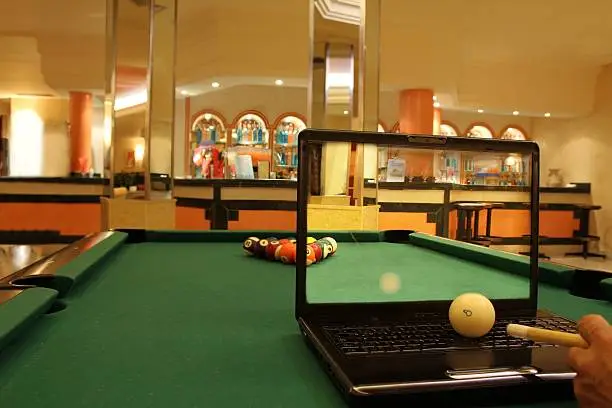 Laptop on the pool table