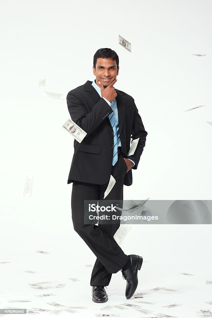 Successful businessman Portrait of confident businessman in money rain Business Person Stock Photo