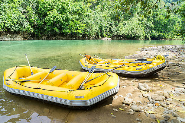 Adventure yellow white water raft stock photo