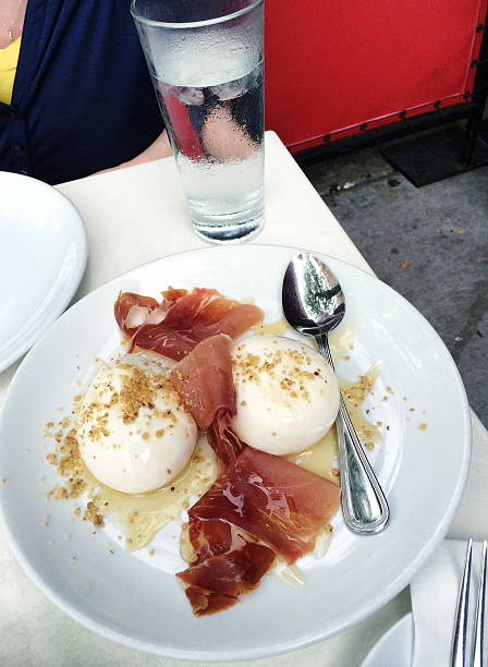 Prosciutto-wrapped Mozzarella dinner. stock photo