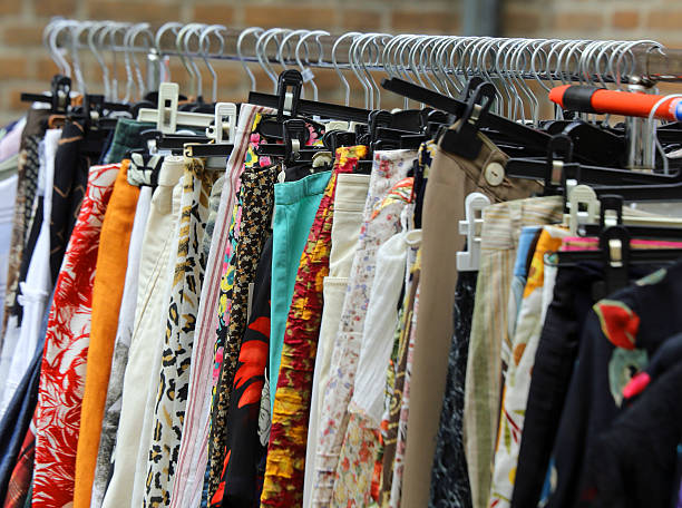 istock vintage clothes hanging in the flea market 478292778