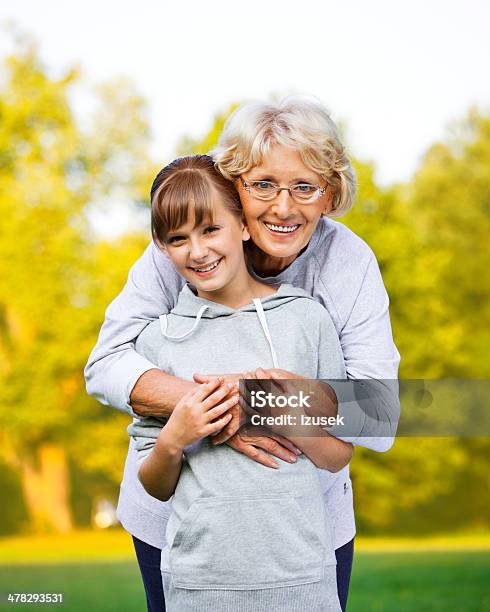 Grandma With Granddaughter Autumn Portrait Stock Photo - Download Image Now - Beautiful People, Grandchild, Granddaughter
