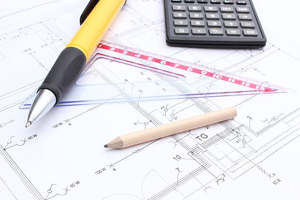 istock Drawing accesories and calculator on housing plan 478296603