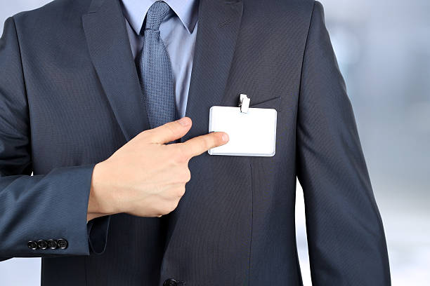 istock The business man showing a  Blank Badge 478296908
