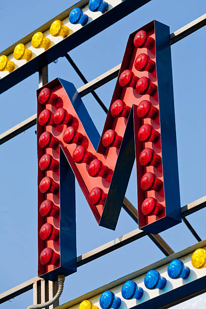 istock M letter circus neon sign 478301070