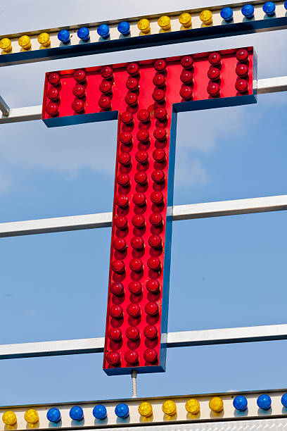 istock T letter circus neon sign 478301104