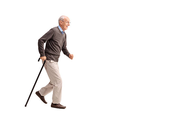 istock Senior man walking fast with a cane 478301238