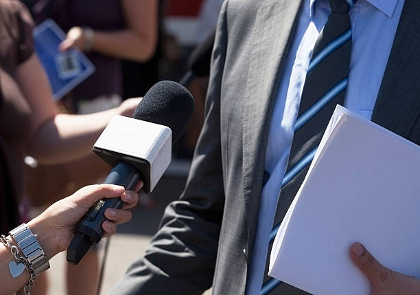 istock Journalist making media interview with businessman 478301792