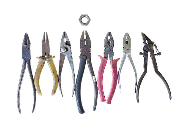istock group of vintage pliers teamwork turning nut 478302104