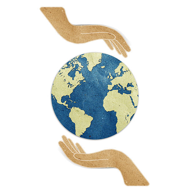 istock Hand and earth recycled paper 478302317