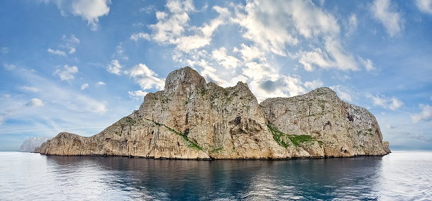 View of Dragonera Island from sea, Mallorca - Spain. Panorama of five vertical frames