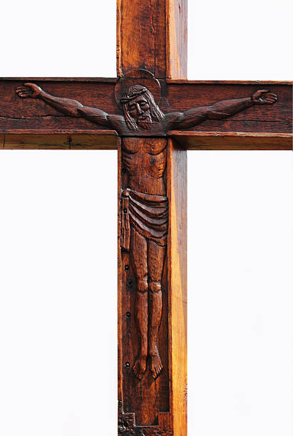 istock crucified Jesus Christ on the cross (antique wooden statue) 478306338
